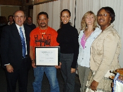 Leah and Celeste present Mr. Melendez with a plaque