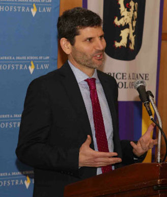 Professor Theo Liebmann Speaking at an Event