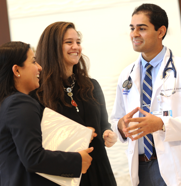 A Medical Student and Two Law Students Talking Together