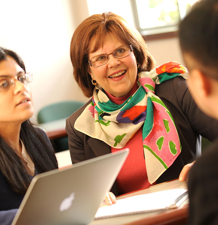 Professor Janet L. Dolgin Speaking with Two Law Students