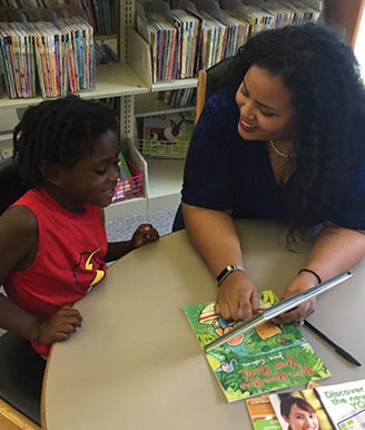 Law student speaking with a child