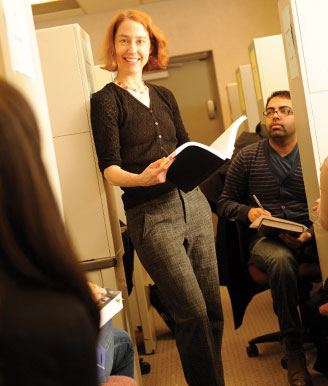 Professor Wren Speaking with Students in the Clinic