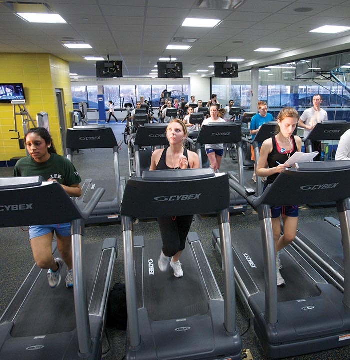 Students Exercising on the Treadmills in the Recreation Center on Campus