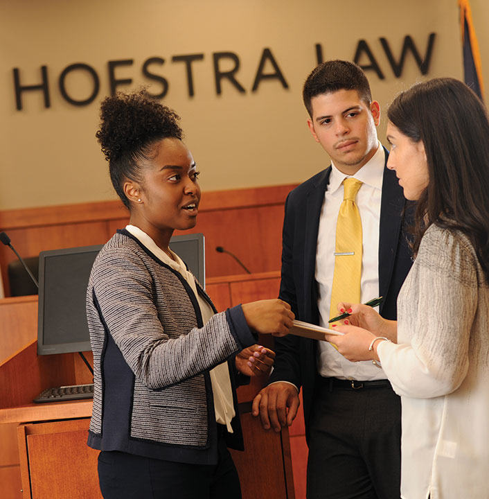 Students Talking in the Moot Court Room