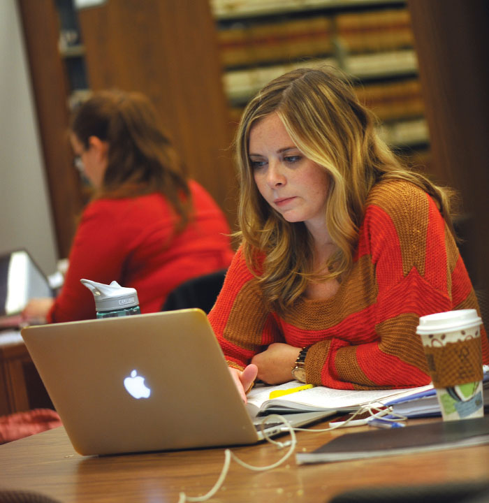 Student Studying in the Law Library
