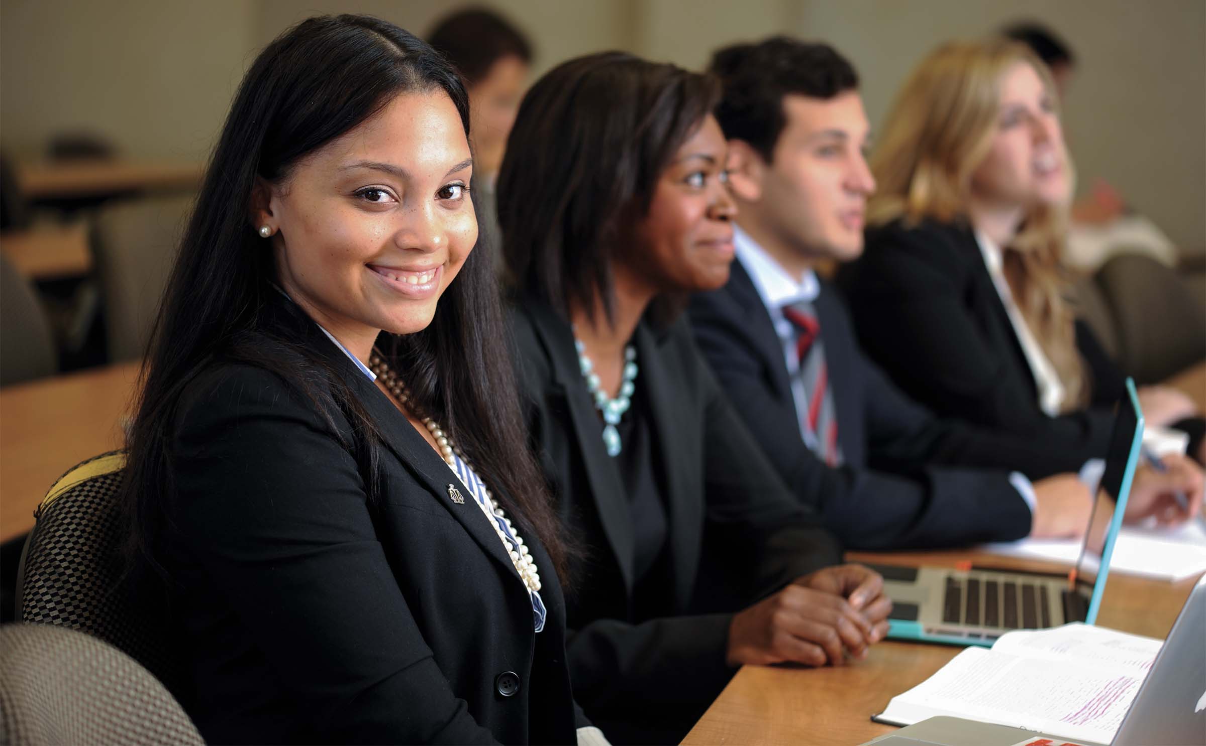 Law students sitting together in a classroom.