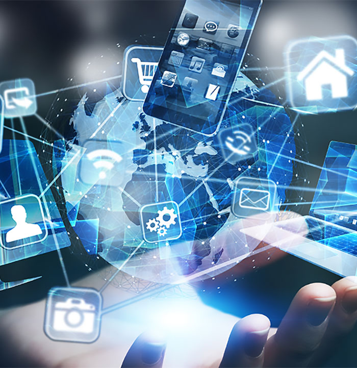 A composite image of current technology icons hovering over a hand