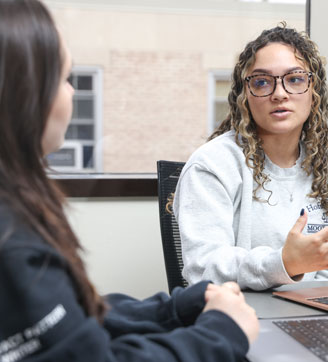 Two students talking.