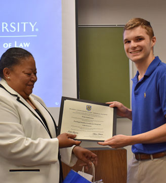 An award being granted to a student.
