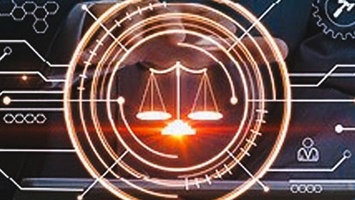 A glowing digital graphic of justice scales is centered within concentric circles and connected lines, symbolizing legal technology or digital justice. A persons hand on a keyboard is visible in the background.